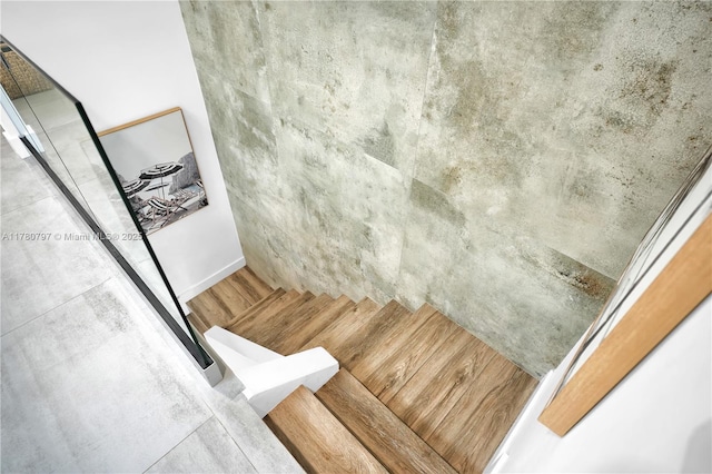 311 Poinciana Dr Unit 801, Sunny Isles Beach, FL 33160 - stairs featuring wood finished floors