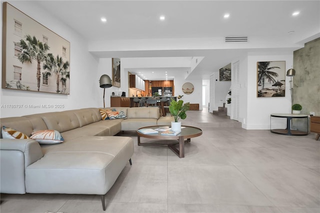 311 Poinciana Dr Unit 801, Sunny Isles Beach, FL 33160 - living area with recessed lighting, stairway, visible vents, and baseboards
