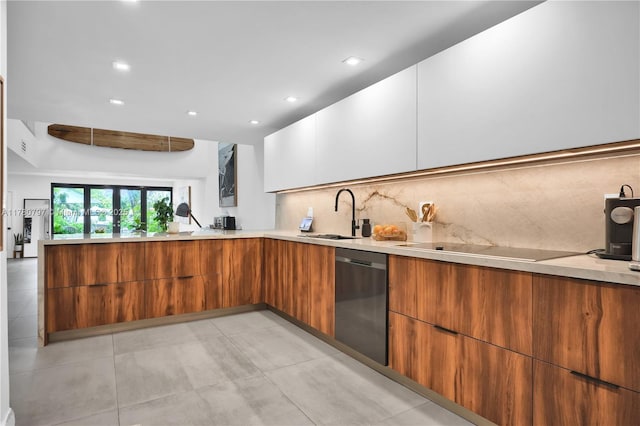 311 Poinciana Dr Unit 801, Sunny Isles Beach, FL 33160 - kitchen featuring light countertops, modern cabinets, brown cabinetry, dishwasher, and a sink