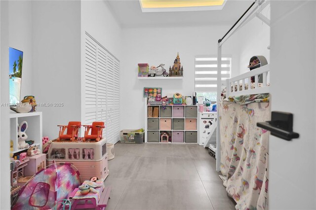 311 Poinciana Dr Unit 801, Sunny Isles Beach, FL 33160 - game room with tile patterned floors