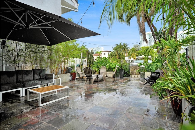 311 Poinciana Dr Unit 801, Sunny Isles Beach, FL 33160 - view of patio / terrace with fence