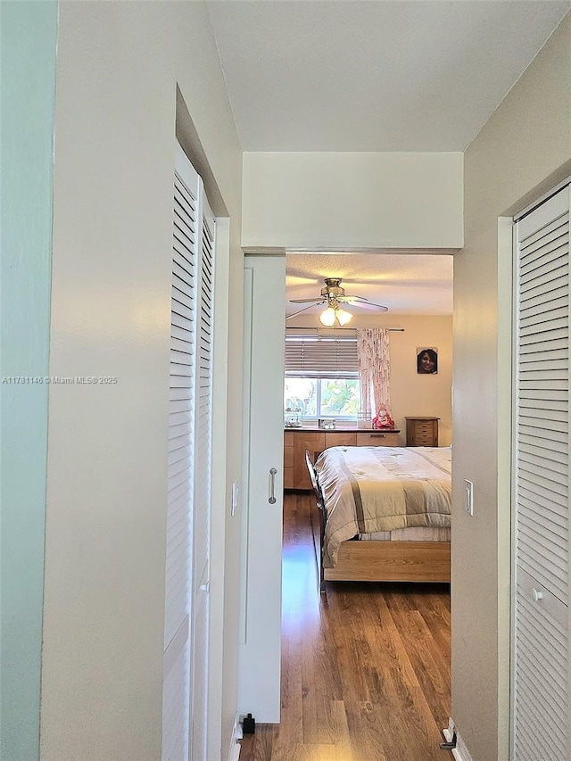 bedroom featuring wood finished floors