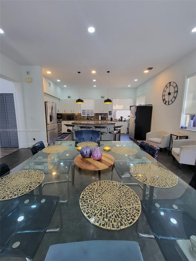 living room with visible vents and recessed lighting