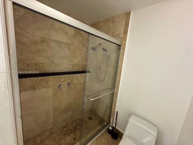 11035 SW 132nd Ct Unit 13-3, Miami, FL 33186 - bathroom featuring toilet and a shower stall