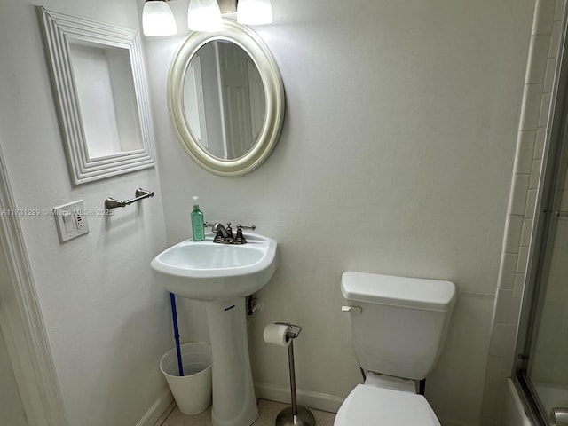 11035 SW 132nd Ct Unit 13-3, Miami, FL 33186 - bathroom featuring baseboards and toilet