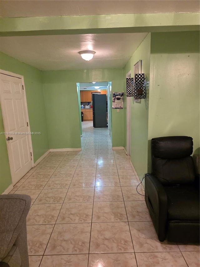 2255 NW 85th St, Miami, FL 33147 - hall featuring light tile patterned floors and baseboards