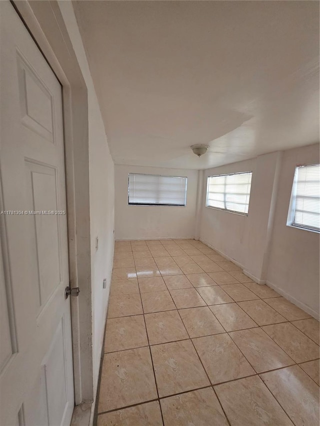 2255 NW 85th St, Miami, FL 33147 - unfurnished room with light tile patterned floors and a wealth of natural light