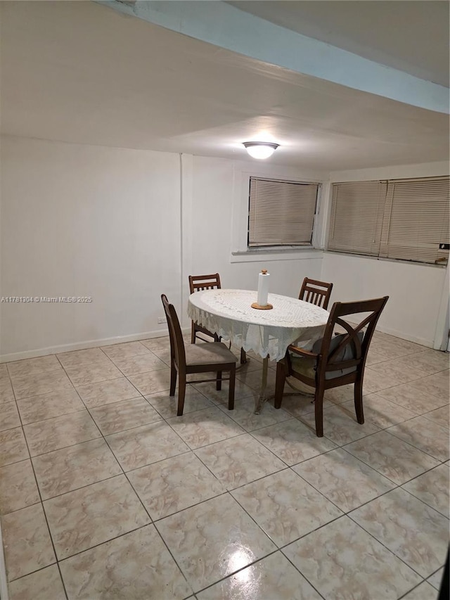 2255 NW 85th St, Miami, FL 33147 - dining space featuring baseboards and light tile patterned flooring