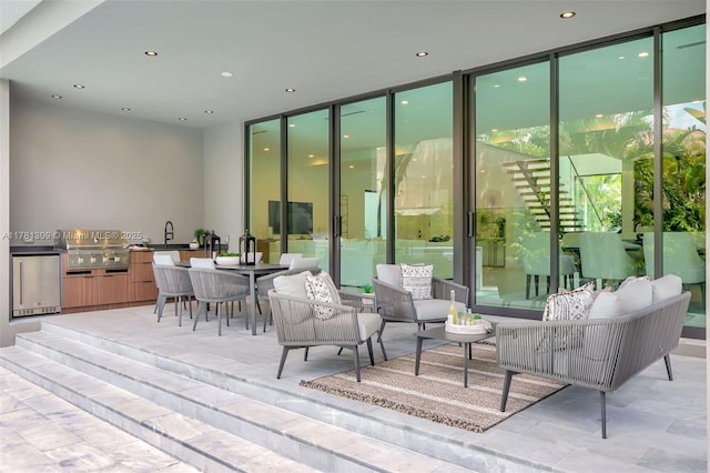 2851 W Trade Ave, Miami, FL 33133 - exterior space featuring grilling area, an outdoor living space, and exterior kitchen