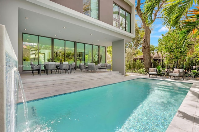 2851 W Trade Ave, Miami, FL 33133 - outdoor pool with a patio and an outdoor hangout area