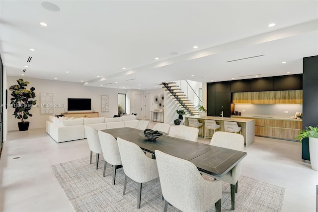 2851 W Trade Ave, Miami, FL 33133 - dining area with bar, stairway, and recessed lighting