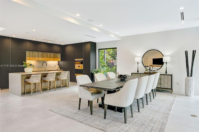 2851 W Trade Ave, Miami, FL 33133 - dining space featuring recessed lighting, finished concrete flooring, and baseboards