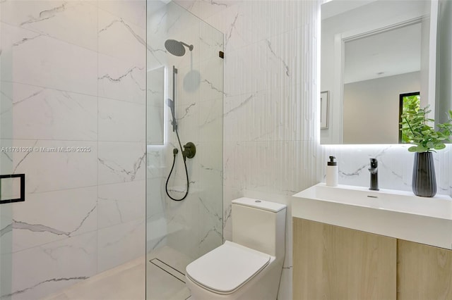 2851 W Trade Ave, Miami, FL 33133 - bathroom with a marble finish shower, tile walls, toilet, and vanity