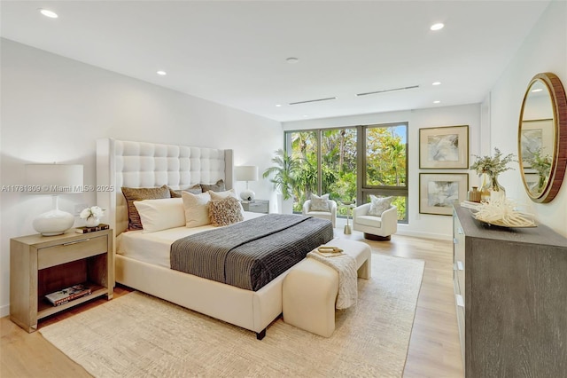 2851 W Trade Ave, Miami, FL 33133 - bedroom featuring light wood-style flooring, recessed lighting, and baseboards