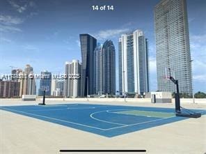 17011 N Bay Rd Unit 701, Sunny Isles Beach, FL 33160 - view of sport court featuring community basketball court and a view of city