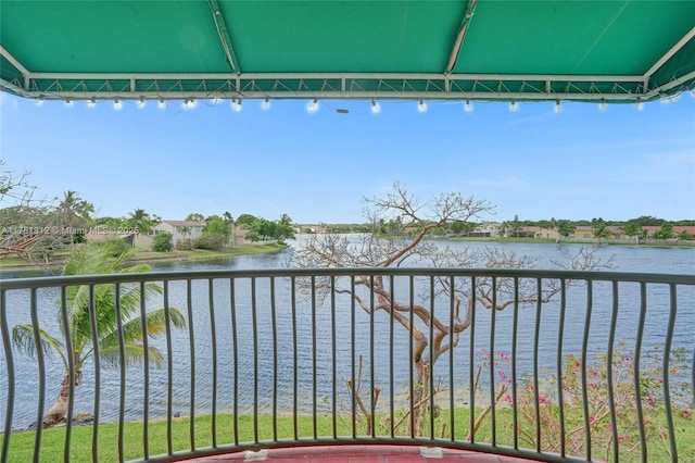 balcony featuring a water view
