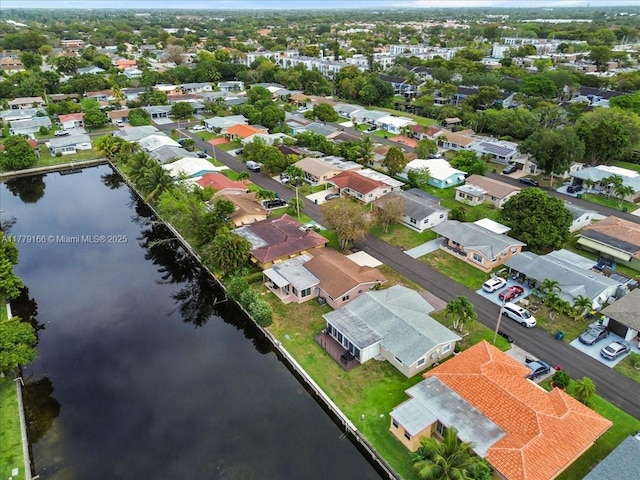 6001 NW 67th Ave, Tamarac, FL 33321 - birds eye view of property with a water view and a residential view