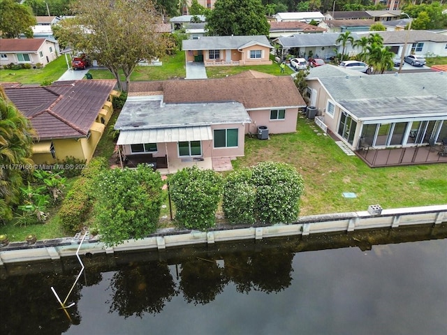 6001 NW 67th Ave, Tamarac, FL 33321 - drone / aerial view with a residential view and a water view