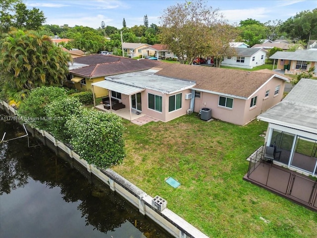 6001 NW 67th Ave, Tamarac, FL 33321 - aerial view featuring a residential view and a water view