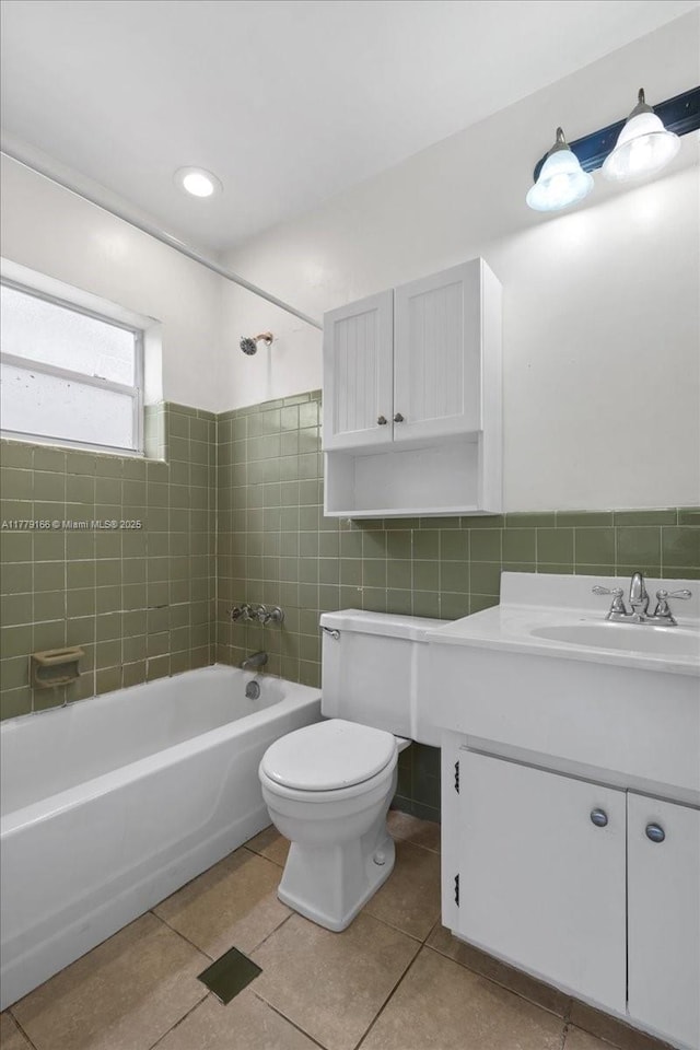 6001 NW 67th Ave, Tamarac, FL 33321 - bathroom with shower / washtub combination, vanity, tile patterned flooring, toilet, and tile walls