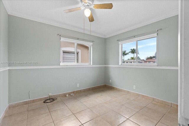 6001 NW 67th Ave, Tamarac, FL 33321 - unfurnished room featuring tile patterned flooring, baseboards, a ceiling fan, and ornamental molding