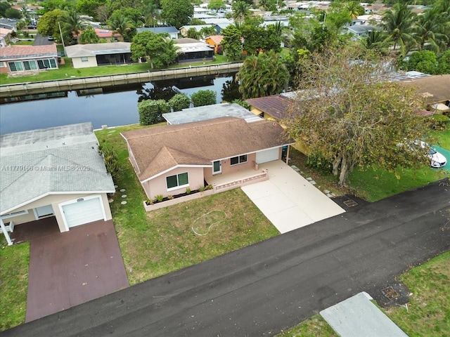 6001 NW 67th Ave, Tamarac, FL 33321 - aerial view featuring a residential view and a water view