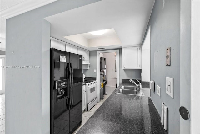 6001 NW 67th Ave, Tamarac, FL 33321 - kitchen featuring dark countertops, black refrigerator with ice dispenser, a tray ceiling, white range with electric stovetop, and a sink
