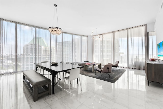 dining area featuring expansive windows and plenty of natural light