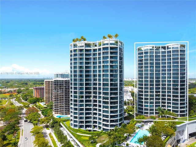 view of property with a city view