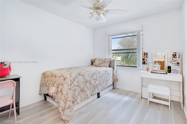 3950 Cocoplum Cir Unit F, Coconut Creek, FL 33063 - bedroom featuring wood finished floors, baseboards, and ceiling fan