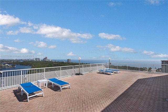 view of patio / terrace with a water view