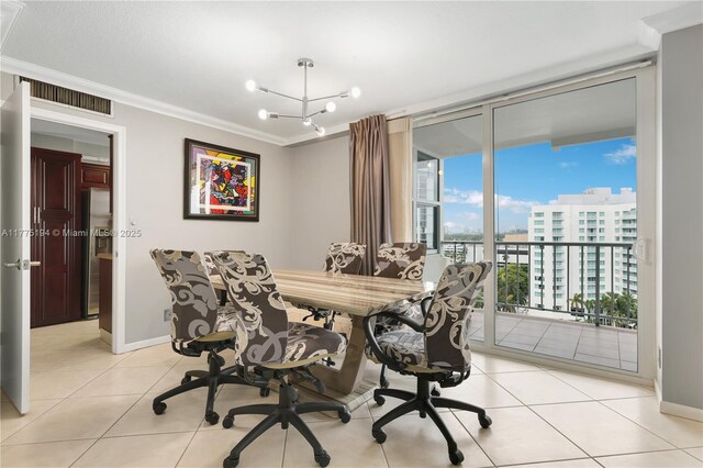 2800 E Sunrise Blvd Unit 14B, Fort Lauderdale, FL 33304 - dining area featuring crown molding, floor to ceiling windows, baseboards, and light tile patterned flooring