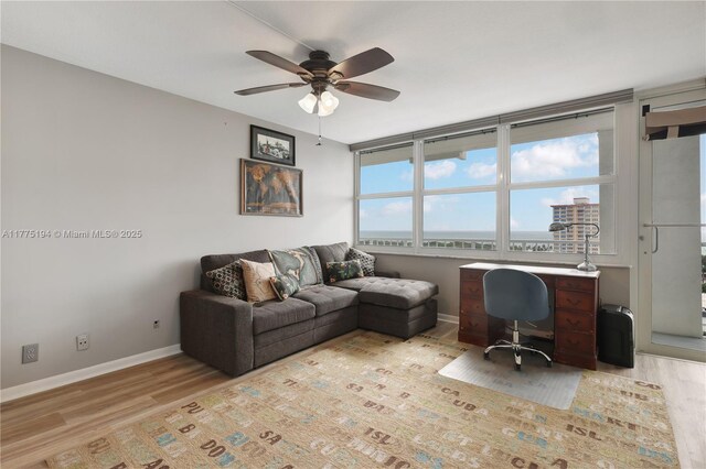 2800 E Sunrise Blvd Unit 14B, Fort Lauderdale, FL 33304 - office space with light wood-type flooring, baseboards, and ceiling fan