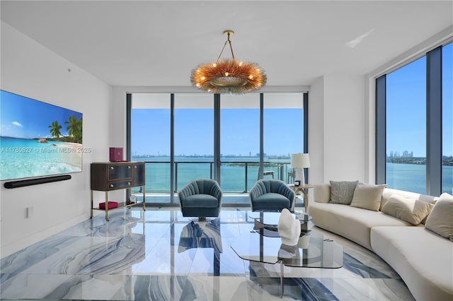 788 NE 23rd St Unit 1001, Miami, FL 33137 - living room with expansive windows, healthy amount of natural light, marble tiled floors, and a water view