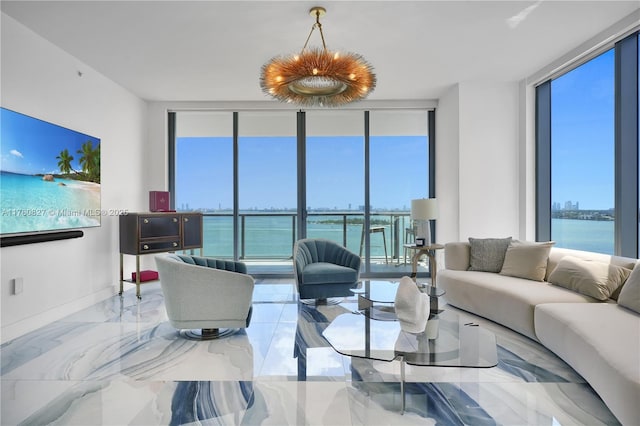 788 NE 23rd St Unit 1001, Miami, FL 33137 - living area with a wall of windows, healthy amount of natural light, and marble tiled flooring