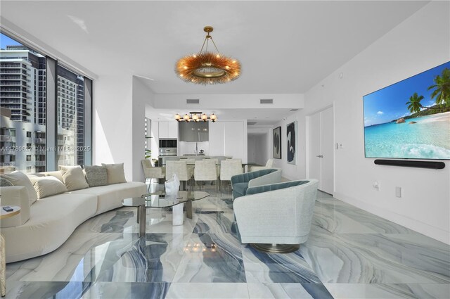 788 NE 23rd St Unit 1001, Miami, FL 33137 - living area featuring light marble finish floors