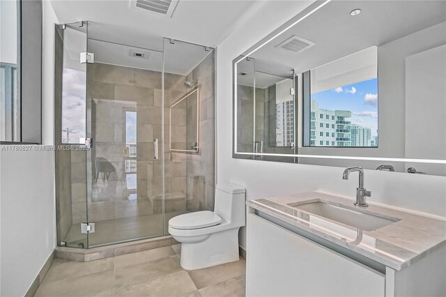 788 NE 23rd St Unit 1001, Miami, FL 33137 - bathroom featuring vanity, a stall shower, and tile patterned floors