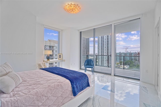 788 NE 23rd St Unit 1001, Miami, FL 33137 - bedroom featuring expansive windows, access to outside, a city view, and marble finish flooring