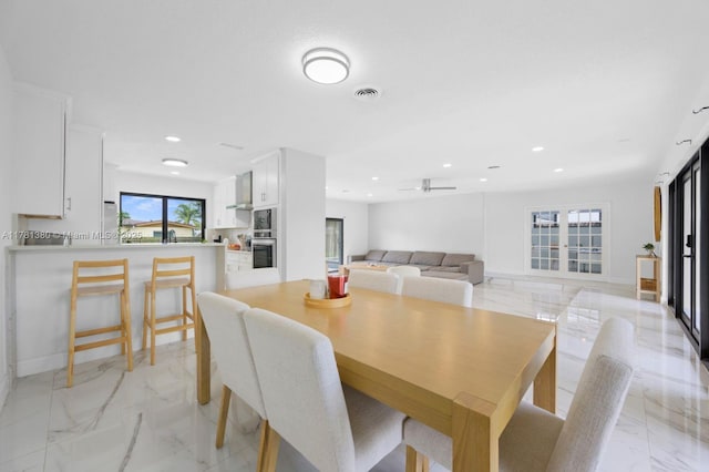 1951 NE 187th Dr, North Miami Beach, FL 33179 - dining space with visible vents, baseboards, a ceiling fan, recessed lighting, and marble finish floor