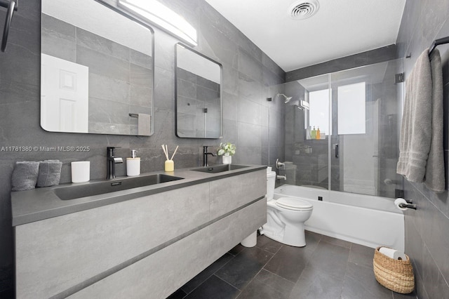 1951 NE 187th Dr, North Miami Beach, FL 33179 - full bathroom featuring a sink, visible vents, and tile walls