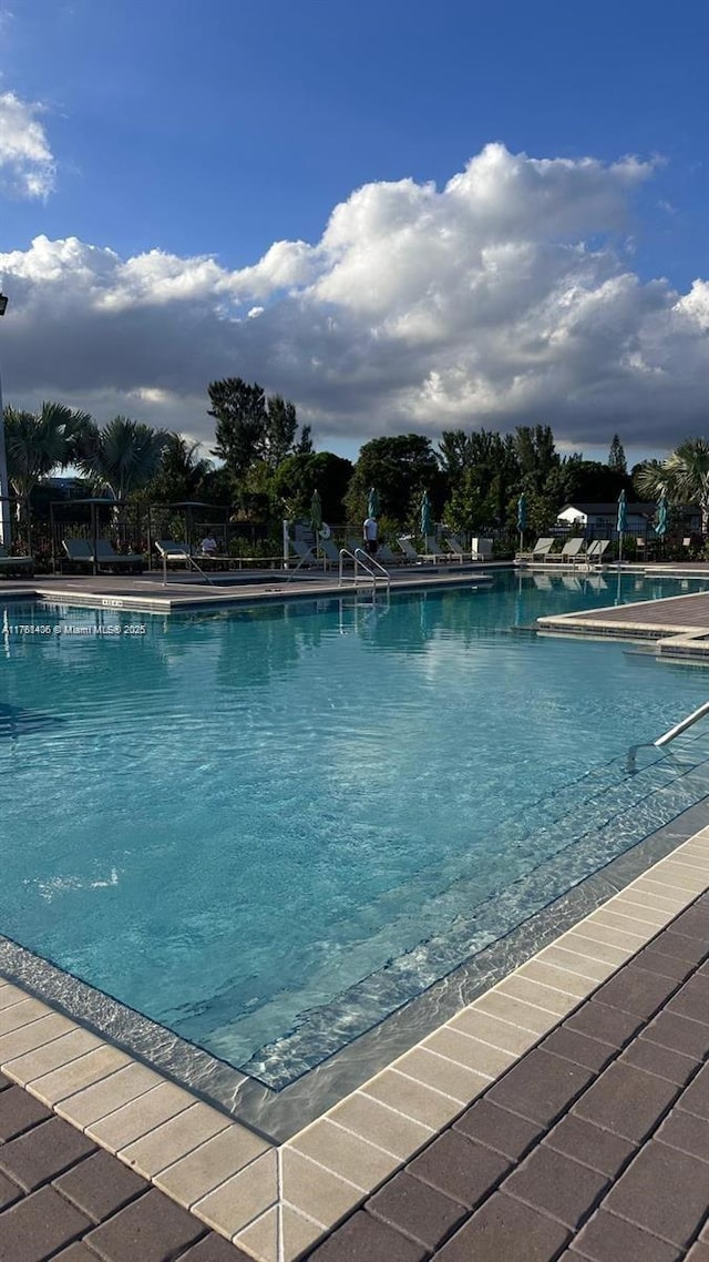 pool with a patio