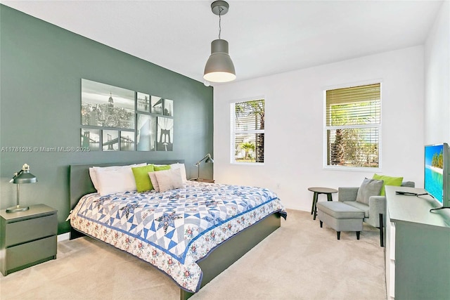 carpeted bedroom with baseboards