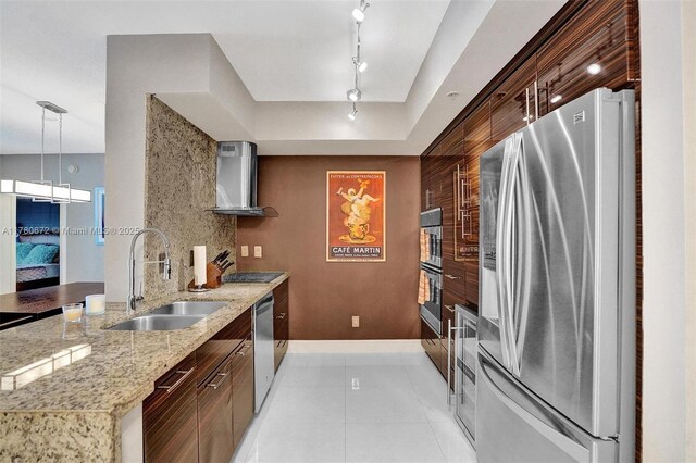 325 S Biscayne Blvd Unit 2519, Miami, FL 33131 - kitchen with light tile patterned floors, a sink, wall chimney range hood, appliances with stainless steel finishes, and a peninsula