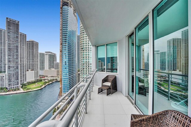 325 S Biscayne Blvd Unit 2519, Miami, FL 33131 - balcony featuring a water view and a city view