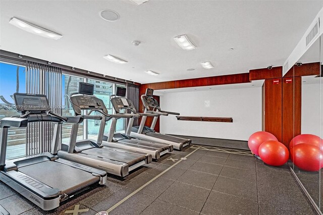 325 S Biscayne Blvd Unit 2519, Miami, FL 33131 - gym featuring visible vents and expansive windows