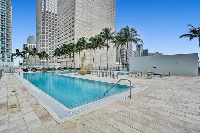 325 S Biscayne Blvd Unit 2519, Miami, FL 33131 - community pool featuring a patio area and a view of city