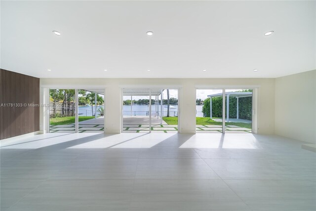 5020 SW 92nd Ave, Miami, FL 33165 - spare room featuring a water view and recessed lighting