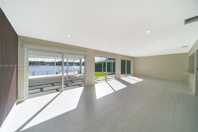 5020 SW 92nd Ave, Miami, FL 33165 - spare room with a water view and recessed lighting