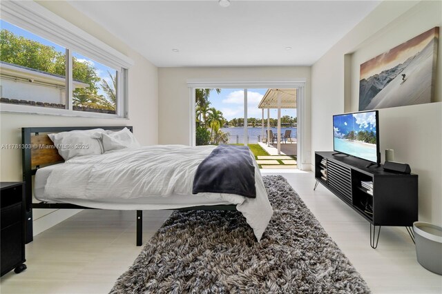 5020 SW 92nd Ave, Miami, FL 33165 - bedroom with access to outside and light wood-style floors