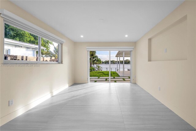 5020 SW 92nd Ave, Miami, FL 33165 - spare room with a water view and recessed lighting